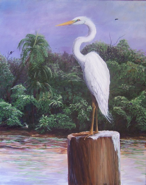Egret on pole hunting