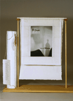 Quiver with book hanging open