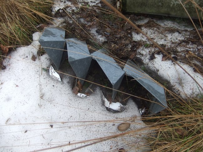 Galvanized found object sculpture