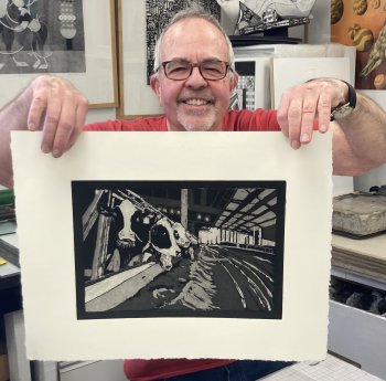 Chuck Bauer with just pulled Etching