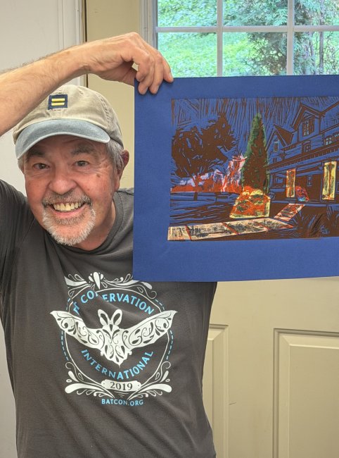 Chuck Bauer pulls a monoprint in the studio.