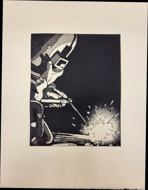 Man Welding in the Dark