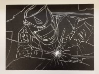 Man Welding
